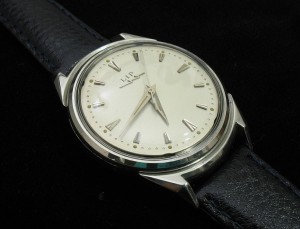 LIP Electronic; Cal. R27; All Stainless Steel; Opens Through Crystal; 38mm diameter; 1958