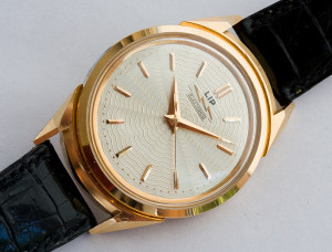 LIP Electronic; Cal. R27; Solid Rose Gold; Opens Through Crystal; 38mm diameter; 1958