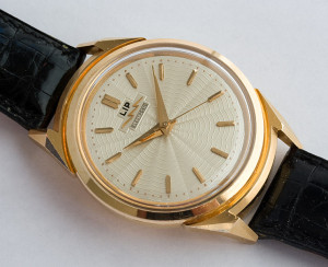 LIP Electronic; Cal. R27; Solid Rose Gold; Opens Through Crystal; 38mm diameter; 1958